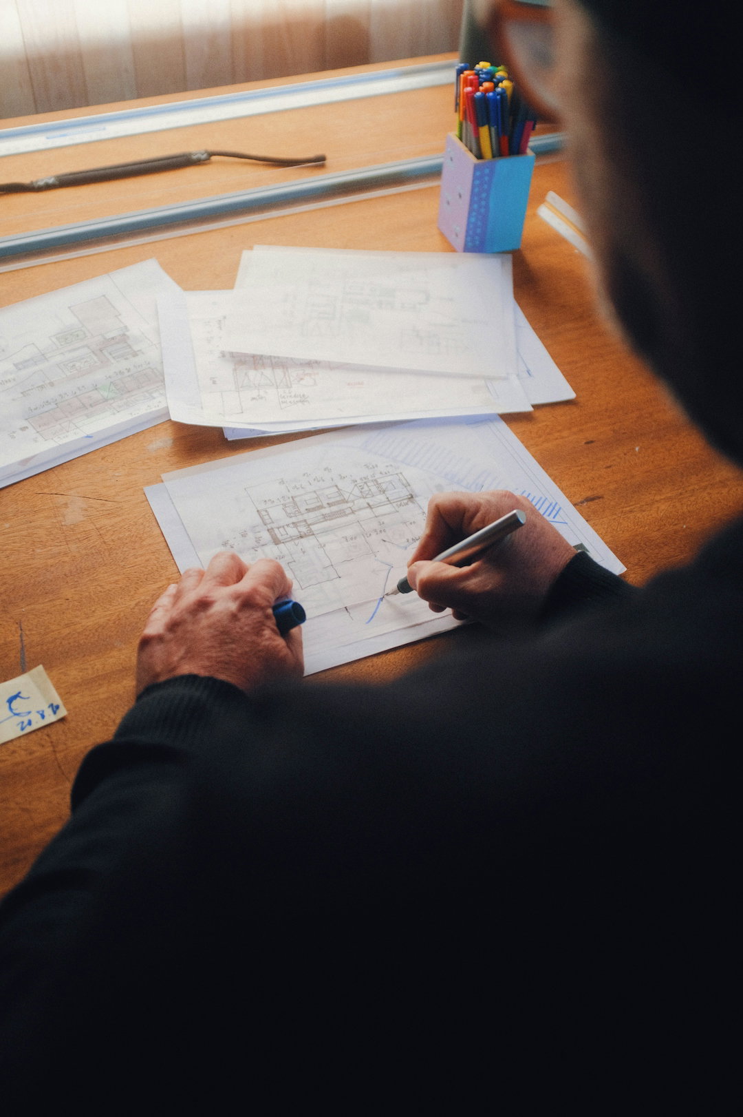 person-writing-on-white-paper.jpg person writing on white paper